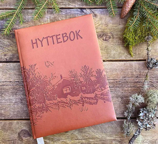 Main Image Cabin book with embossed cabin design
