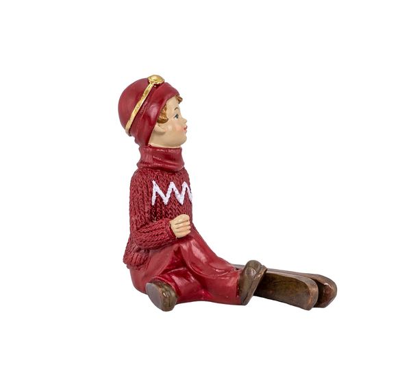 Main Image Boy with skis, sitting